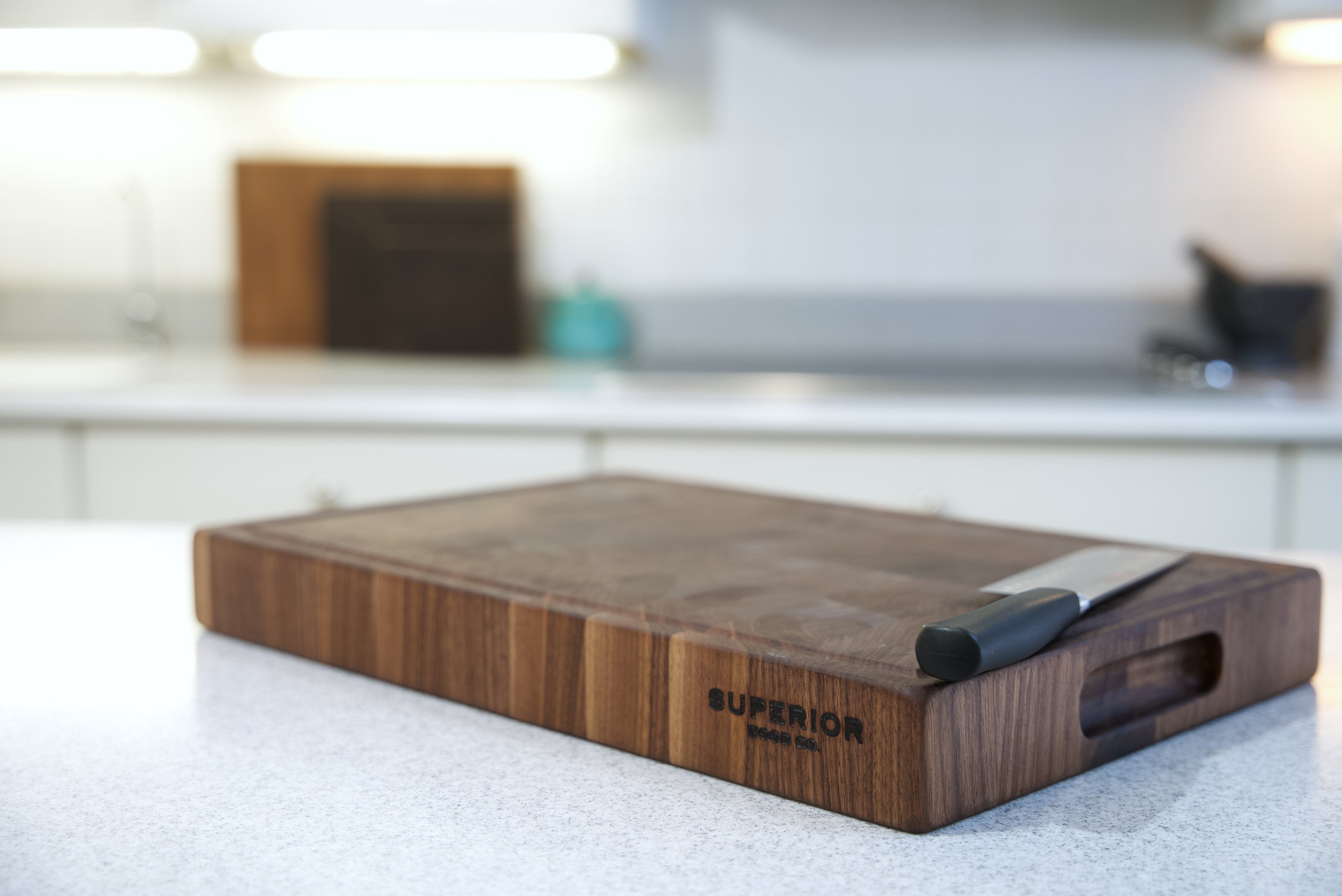 Black Walnut End Grain Cutting Board with a Juice Groove and Finger Groove Handles